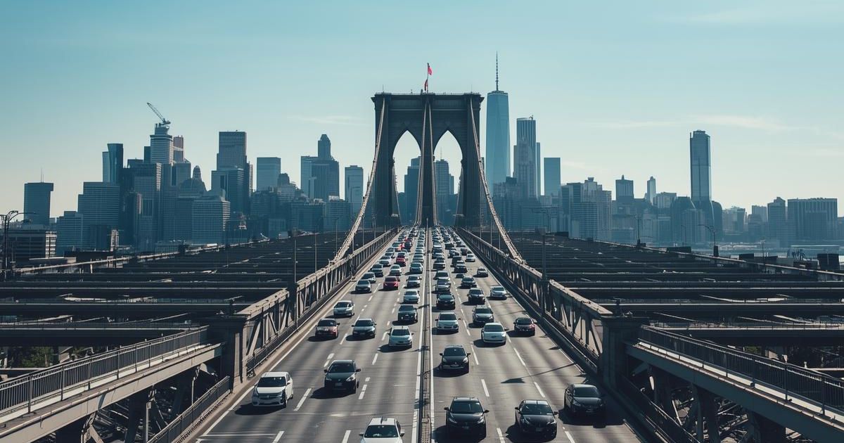 A bridge leading to a city