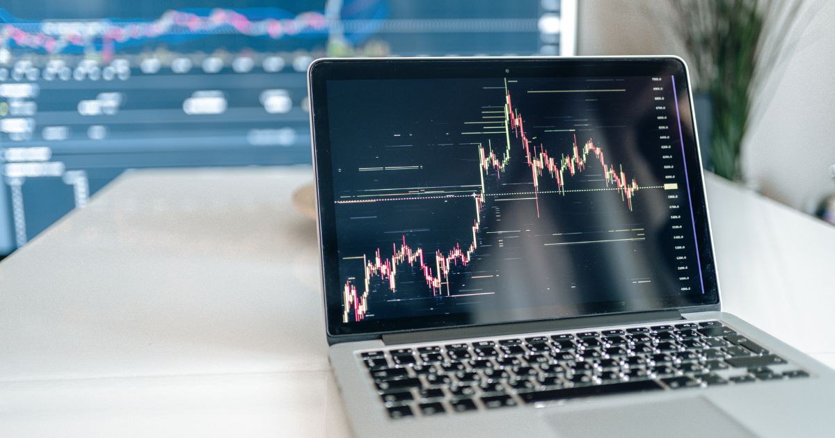A laptop showing trading data