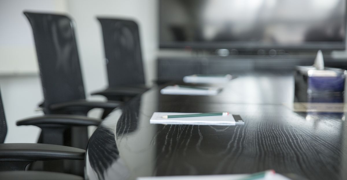 Meeting room table with pen and pads