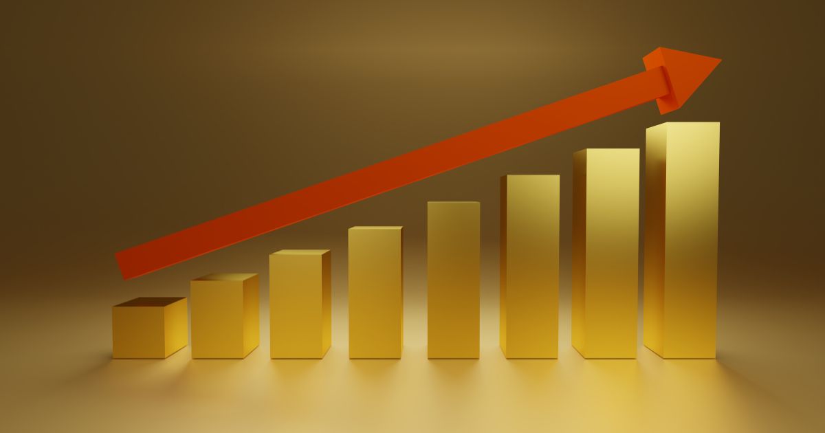 A bar graph with an arrow pointing diagonally upwards