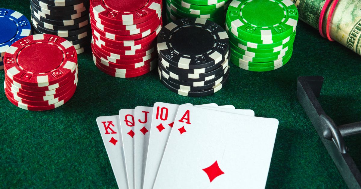 A poker hand and poker chips